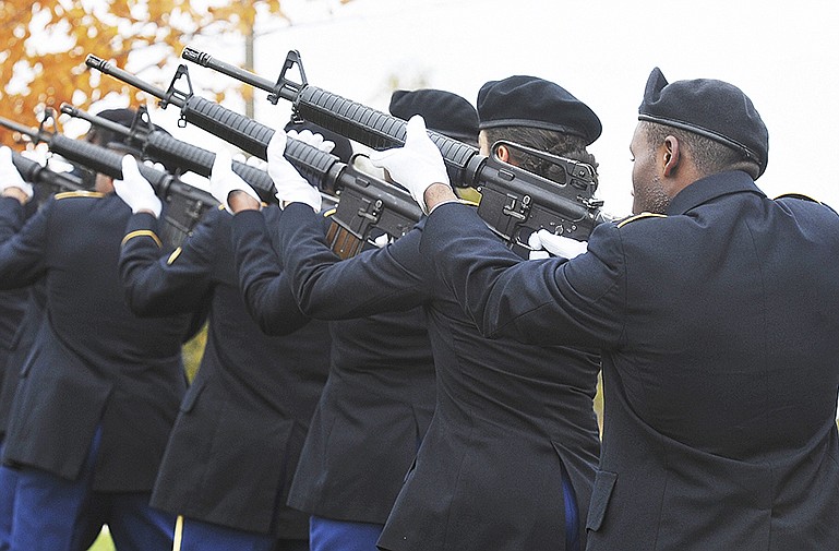 Members of the Blue Tiger ROTC Battalion fire a 21-gun salute at the close of Lincoln University's  Veterans Day ceremony on Nov. 11, 2014.