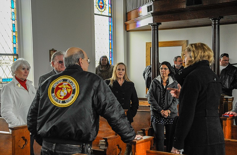 Dale and Sandy Deraps shared the history of Cedron church with Gold Star families, who paid their respects at the memorial to the Deraps' son, Leon, Thursday.