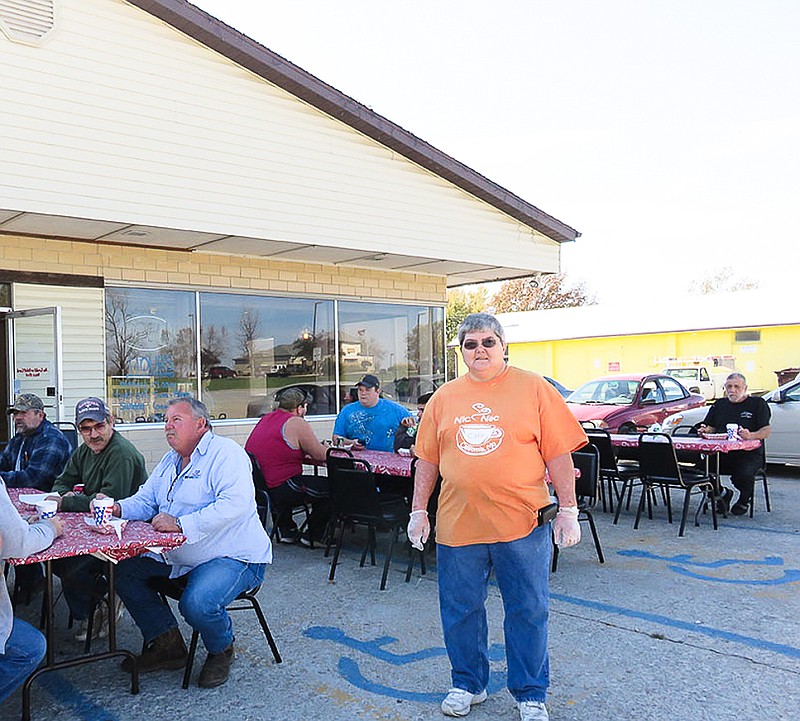 Jackie Heather, owner of Nic Nac, enjoys talking with customers during Customer Appreciation Day, Nov. 3.