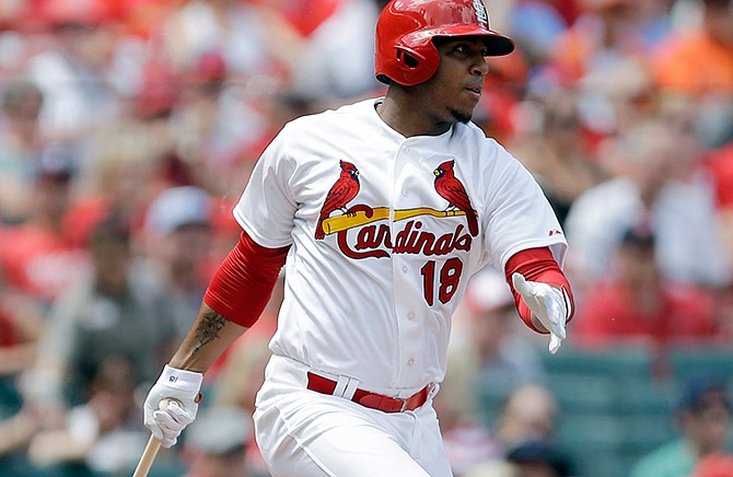 In this June 1, 2014, file photo, St. Louis Cardinals' Oscar Taveras grounds out during a baseball game against the San Francisco Giants in St. Louis. Dominican officials say Taveras was drunk at the time of his fatal car crash last month. Tessie Sanchez, a spokeswoman for the attorney general's office in the Dominican Republic, told The Associated Press on Wednesday, Nov. 12, 2014, that toxicology reports showed Taveras had a blood-alcohol level five times the legal limit when he lost control of his car Oct. 26 on a highway in Puerto Plata.