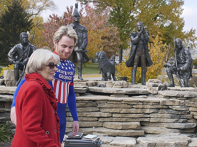 Cory Droulliard met with sculptor Sabra Tull Meyer at the Lewis & Clark Trailhead Plaza on Capitol Avenue Wednesday morning.
