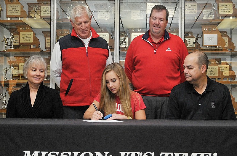 Jefferson City senior Brooke Thompson signed a national letter of intent Wednesday morning to play golf at Baylor University in the Fleming Fieldhouse lobby. Seated with her are her parents, Gail and Tim Thompson. Standing (from left) is Jefferson City coach Randy Bickel and Jefferson City Country Club golf pro Kevin Dunn.