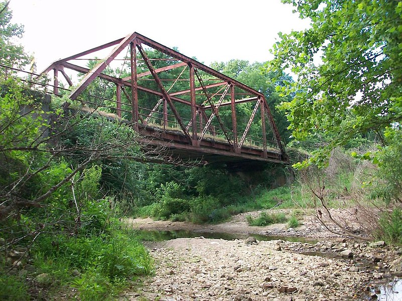 The Hillers Creek Bridge near New Bloomfield is scheduled for replacement in Spring 2015. Because the structure has historical significance, it is being offered up as part of the Missouri Department of Transportation's Free Bridge program. Anyone interested in relocating and repurposing the bridge has until Jan. 15 to submit a proposal to MoDOT.