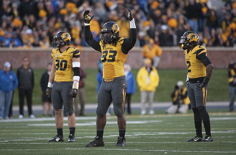 Missouri defensive lineman Markus Golden (33) pumps up the crowd during a Nov. 1 game against Kentucky. The Tigers' defense faces a tough task today at Texas A&M.