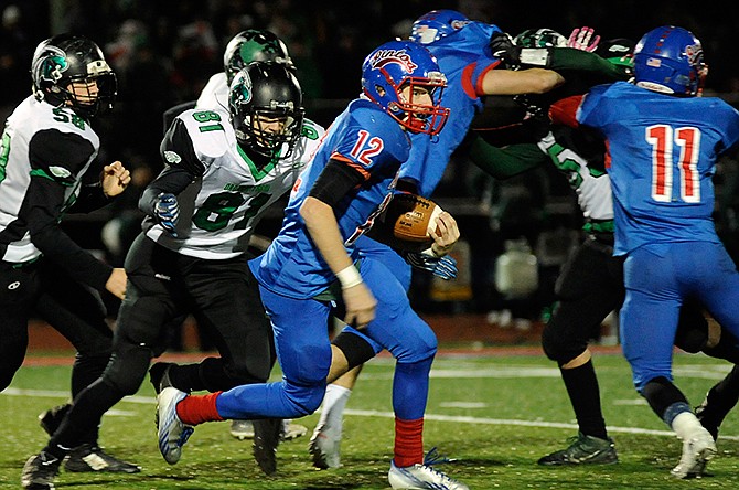 
California kick returner Allan Burger looks for open running room in the fourth quarter of Friday night's MSHSAA Class 3 quarterfinal matchup against Orchard Farm at Riley Field.