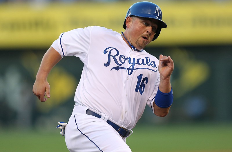 Billy Butler agreed to a three-year contract with the Athletics.