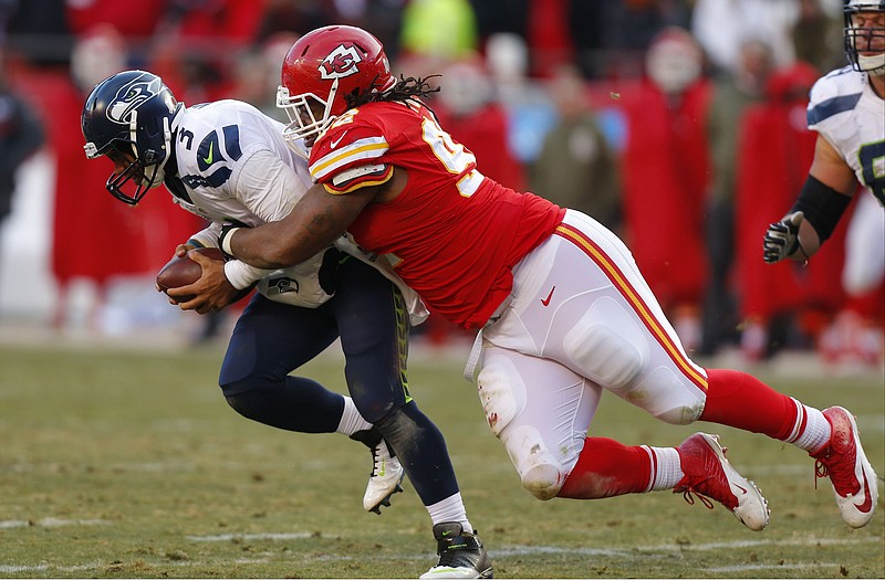 Chiefs nose tackle Dontari Poe sacks Seahawks quarterback Russell Wilson in the second half of Sunday's game at Arrowhead Stadium.