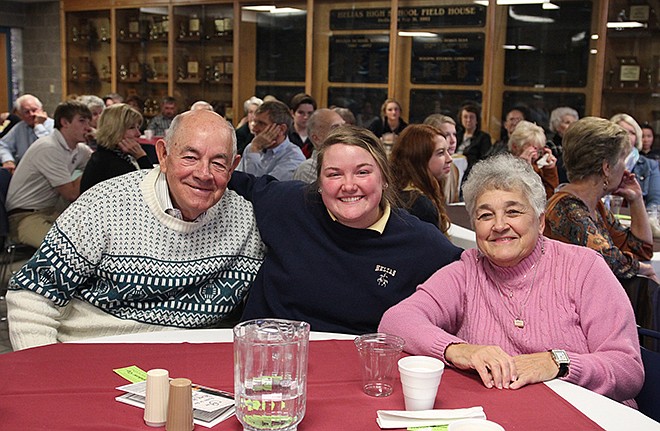 Helias student Katy Hunt poses with her grandparents, Don and Jean James. They were part of the Grandparents' Day activities at the high school, which drew several hundred grandparents to school for a mass, sit-down lunch and tour of the facility.