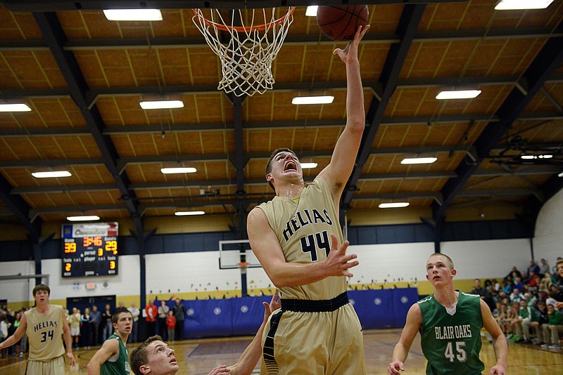 Helias' Trevor Koelling goes up for a layup in the Crusaders' game against Blair Oaks on Friday night in the Helias Gym.