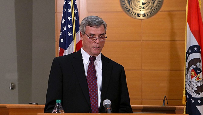 St. Louis County Prosecutor Robert McCulloch announces the grand jury's decision not to indict Ferguson police officer Darren Wilson in the Aug. 9 shooting of Michael Brown, an unarmed black 18-year old, on Monday, Nov. 24, 2014, at the Buzz Westfall Justice Center in Clayton, Mo.