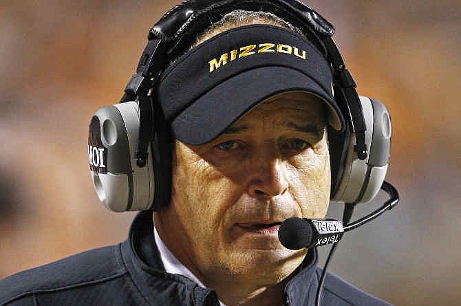 Missouri coach Gary Pinkel walks the sideline in the second half of an NCAA college football game against Tennessee on Saturday, Nov. 22, 2014 in Knoxville, Tenn.