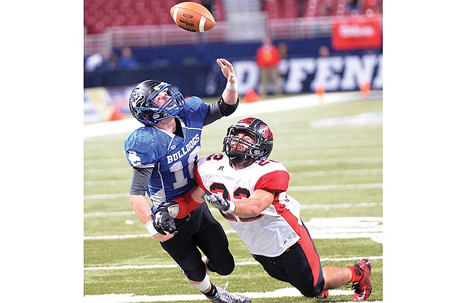 Cory Hanger of South Callaway makes a one-handed catch as Lamar's Brett McDonald defends in the first quarter of the Class 2 state championship game Saturday in St. Louis.