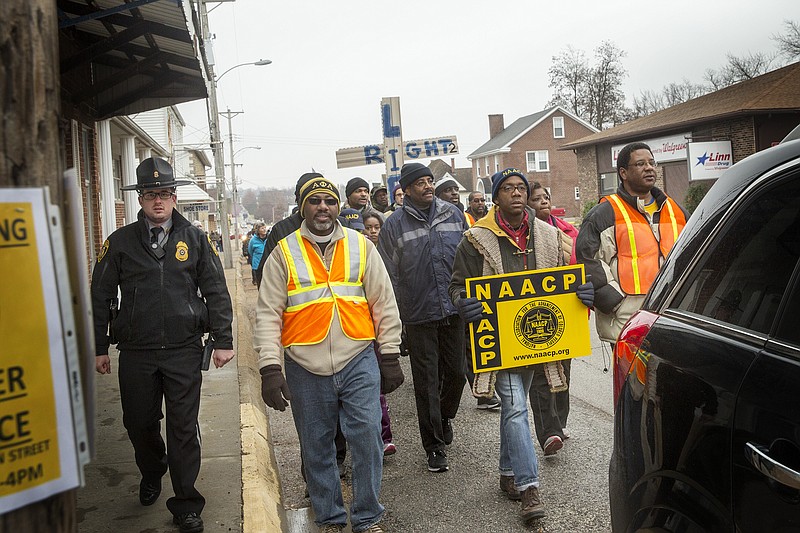 Members of the NAACP Journey for Justice weeklong march from Ferguson to Jefferson City make their way through Linn on Highway 50 Thursday morning on their way to the Capitol.