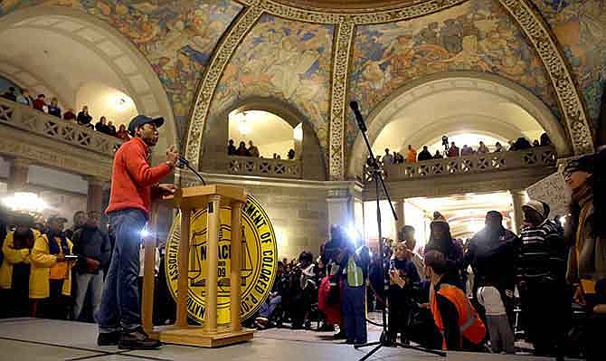 NAACP President Cornell Brooks speaks in the Missouri Capitol rotunda after finishing a 7-day march Friday, Dec. 5, 2014, in Jefferson City, Mo. Scores of people, including Brooks, finished their 130-mile "Journey for Justice" march from the St. Louis suburb of Ferguson to protest the police shooting of Michael Brown. 