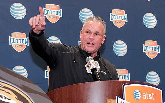 In this Jan. 1, 2014, file photo, Missouri defensive coordinator Dave Steckel speaks during an NCAA college football news conference in Irving, Texas.