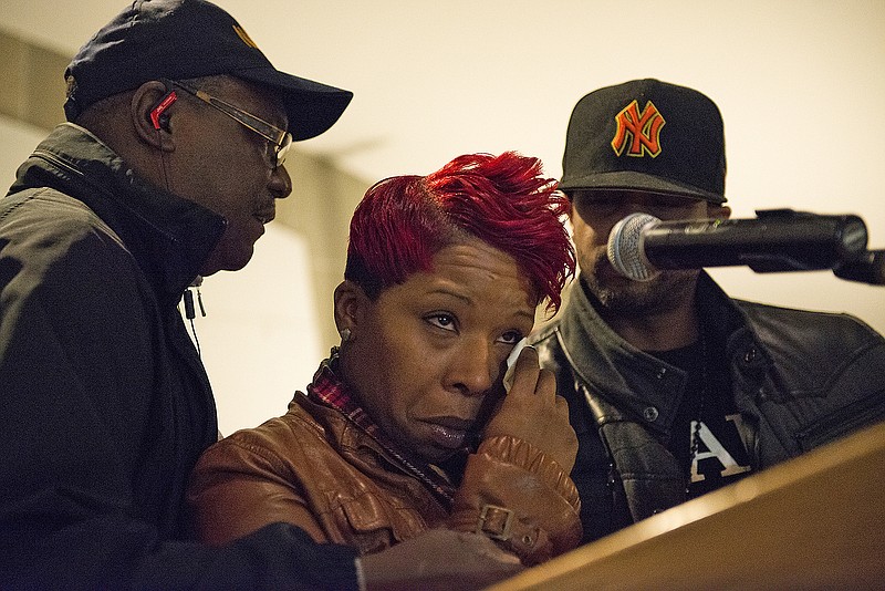 Lesley McSpadden sheds tears after speaking at the Missouri Capitol in Jefferson City on Friday.