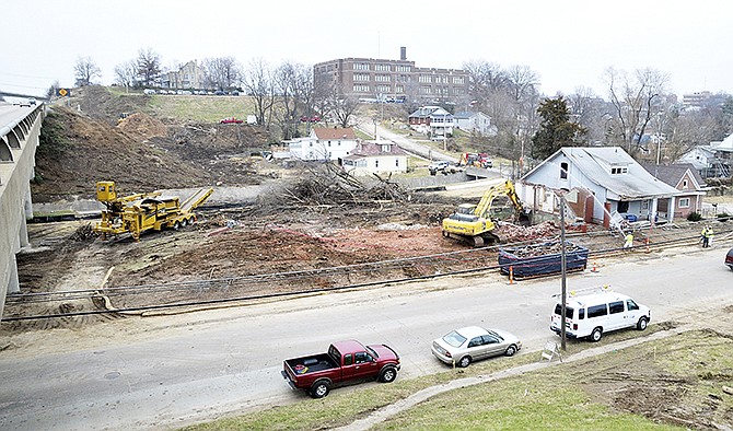 The landscape is rapidly changing in the area of Lafayette and East Miller streets. Crews from Jeff Schnieders Construction and ARSI are making room for the MoDOT interchange and ramps to be constructed. The buildings being removed were in an area known as the northern end of "The Foot" and included a building known as "The Monestary," named in the 1930's by two Lincoln University professors - Cecil Blue and Lorenzo Greene.