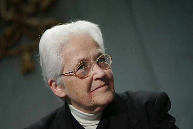 Sister Sharon Holland reacts during a press conference at the Vatican, on Tuesday. The Vatican went out of its way Tuesday to mend fences with American religious sisters, thanking them for their selfless work caring for the poor, gently suggesting ways to survive amid a decline in numbers and promising to value their "feminine genius" more.