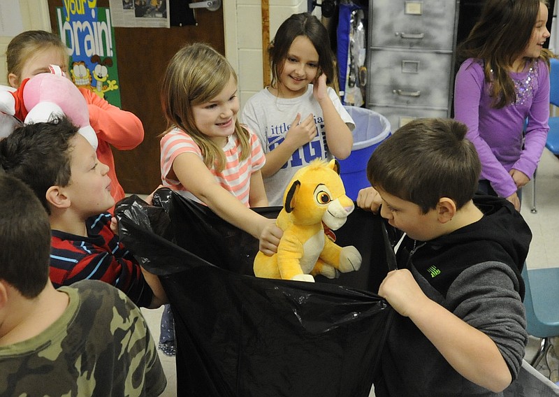 Students in Sarah Kennedy's Russellville Elementary School second-grade classroom have been collecting stuffed animals to donate to the patients at St. Louis Children's Hospital this Christmas. A fellow classmate, Maelynne Cartee, has been a patient there the last few months, after sustaining a head injury from being trampled by a cow.