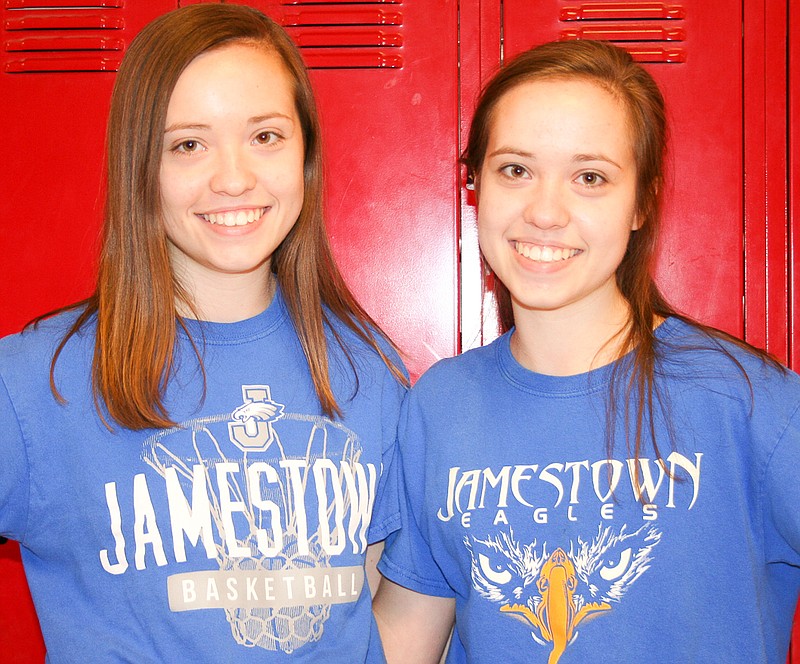 Identical twins (from left) Maggie and Angie McNay are one of three sets of twins on the Jamestown girls basketball team. Maggie is 2 minutes older than Angie.