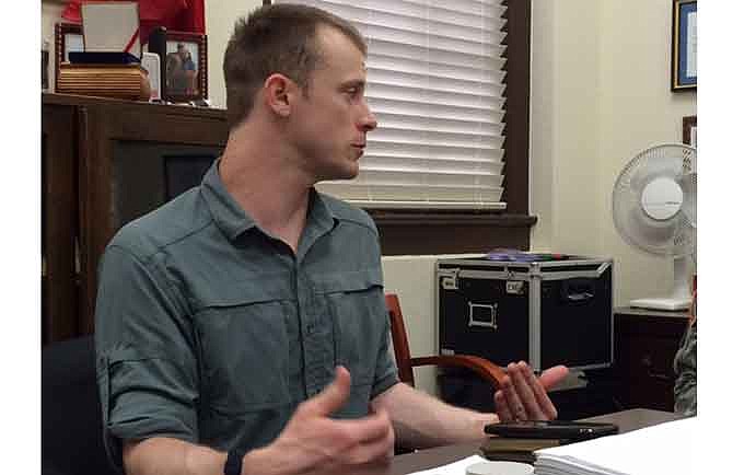 In this Aug. 2014 file photo provided by Eugene R. Fidell, Sgt. Bowe Bergdahl prepares to be interviewed by Army investigators. U.S. officials have finished an investigation into how and why Army Sgt. Bowe Bergdahl  disappeared from his base in Afghanistan. Bergdahl was held captive for five years by the Taliban. (AP Photo/Eugene R. Fidell, File)