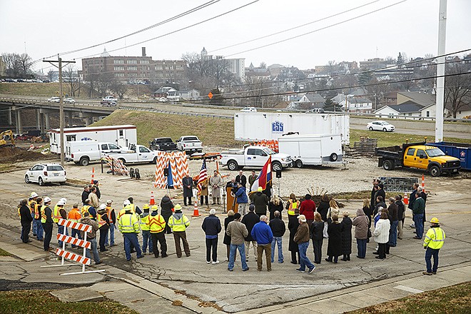 A crowd gathers near the old Boys and Girls Club building during Friday's official groundbreaking ceremony for the interchange at U.S. Route 50 and Lafayette Street. The $20.3 million project, which is expected to be finished in 2016, will add four ramps off 50 to Lafayette, with the hopes of making it easier to get from the highway to Lincoln University and Jefferson City High School.