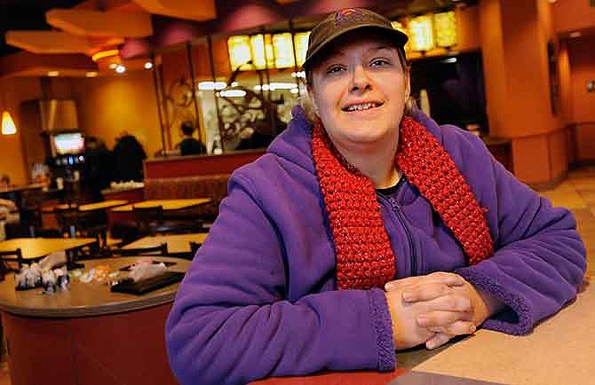 Jenna Kelsey is shown at her full-time job at Taco Bell. The Jefferson City Day Care Center is what enables her to go to work every day without having to worry about her two daughters. Kelsey works at Taco Bell, as well as two nights per week with a cleaning service.