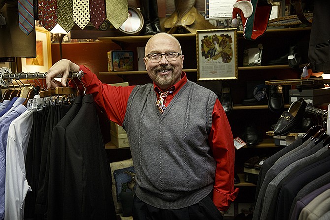 Steve Gilpin poses with an assortment of menswear in his High Street business High Handsome. 