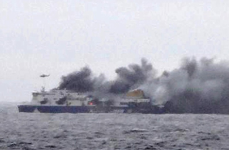 In this photo taken from a nearby ship, smoke rises from the Italian-flagged Norman Atlantic after it caught fire in the Adriatic Sea on Sunday.