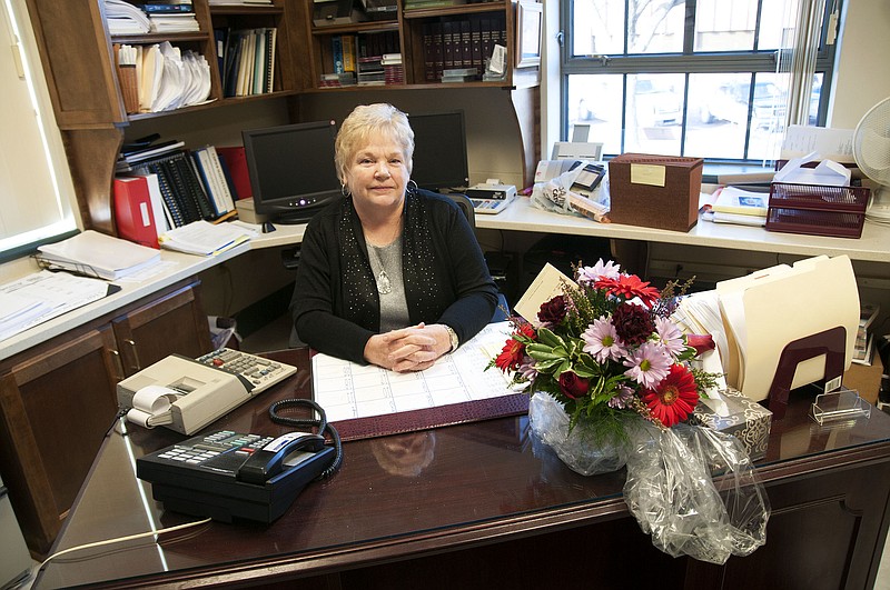 Rosemary Gannaway, the former Callaway County auditor, poses for a photo inside her office on Wednesday - her last day on the job. She has spent the past 28 years as auditor and is now a retiree.