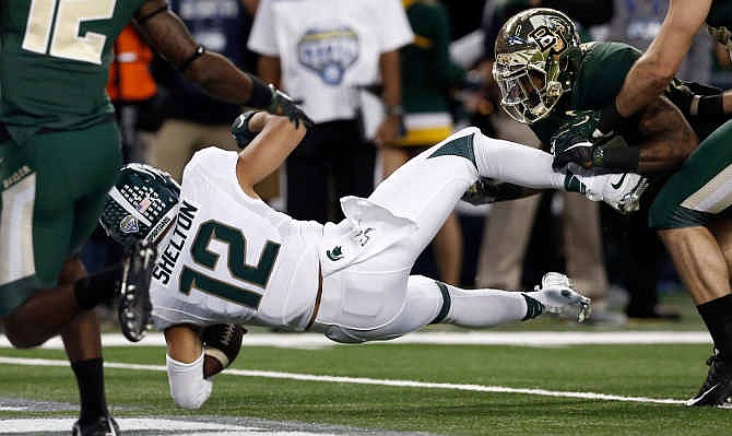 Michigan State wide receiver R.J. Shelton (12) scores a touchdown during the first half of the Cotton Bowl NCAA college football game against Baylor, Thursday, Jan. 1, 2015, in Arlington, Texas.