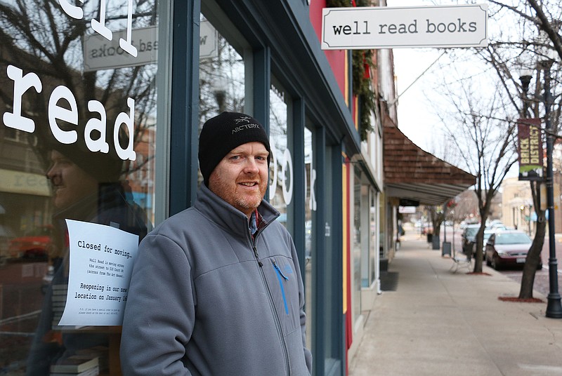 Well Read bookstore owner Brian Warren stands outside of the store's current location on Court Street. The store is in the process of moving across the street. It will be closed until Jan. 16.