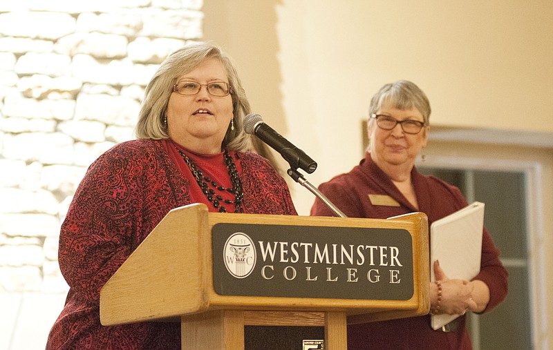 Cathi Miller Harris with Westminster College gives an acceptance speech after receiving the Loyal Subject Award from the chamber of commerce Thursday night during its annual banquet.