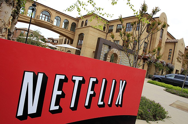 The exterior of Netflix headquarters is shown in Los Gatos, California. Even as Netflix continues to pump out more original programming, its bosses say they will continue to keep secret details on how many people are actually watching. The streaming service, with 53 million subscribers, doesn't pay for the third-party ratings service provided by the Nielsen company.