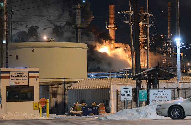 Heavy black smoke billows from Husky Lima Refinery after an explosion at the facility that shook Lima and the surrounding area Saturday in Lima, Ohio. 