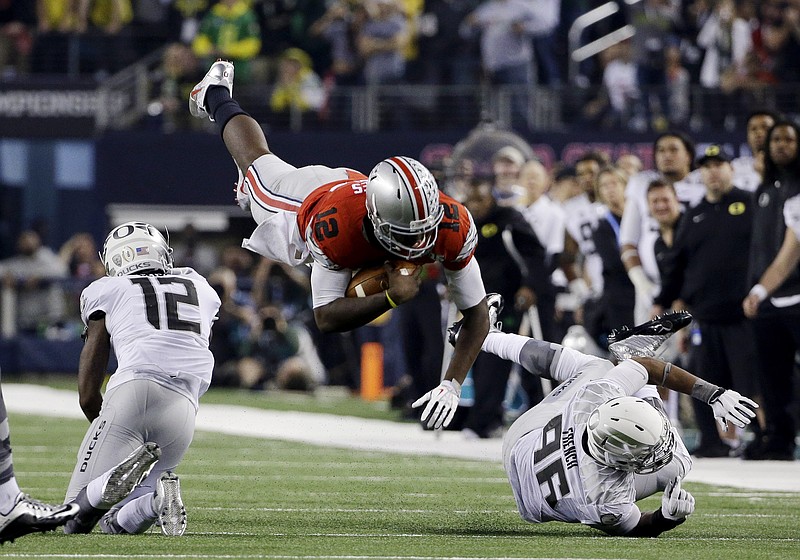 Ohio State quarterback Cardale Jones dives for a first down during the second half of Monday night's game against Oregon in Arlington, Texas.