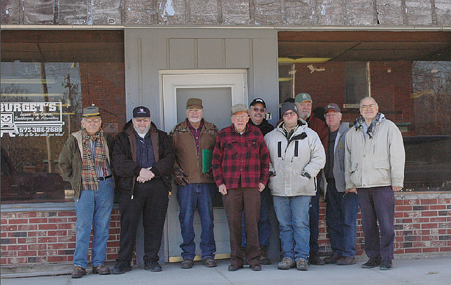 Members of Elijah Gates Camp of Sons of Confederate Veterans pose in front of their new office space in Auxvasse. The location will be used for meetings, as home for a historical display and as a research library.