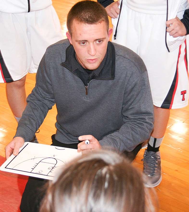 
Tipton girls basketball head coach Jason Culpepper designs a play for his team. Culpepper, who took over the program three years ago, had 14 wins his first season and 21 last year. The Lady Cardinals began this season 10-0.