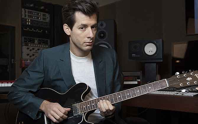 In this Friday, Dec. 12, 2014 photo, Mark Ronson poses for a photo at Jeff Bhasker Studio, in Venice, Calif. Ronson has multiple Grammy Awards and the current No. 1 song in the U.S. and U.K. (Photo by Rebecca Cabage/Invision/AP)
