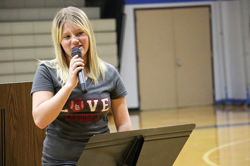 South Callaway sixth grade student Sierra Merrit performs her poem during a poetry slam Thursday, Dec. 18.  She was awarded second place and read her poem for the school board at its January meeting.