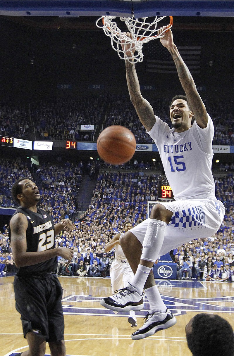 Kentucky's Willie Cauley-Stein dunks in front of Missouri's Jakeenan Gant during Tuesday's game in Lexington, Ky. The Tigers will try to bounce back from their 39-point loss to the Wildcats today against Tennessee.