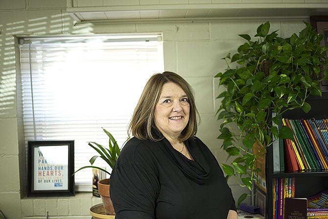 Marcia Ramatowski, above, stands in the Adult Basic Literacy Education Learning Center headquarters on Dunklin Street. Ramatowski, a retired teacher, shares a passion for education with her mother, Amie Morrow, left, who started ABLE in the mid-1980s. Though her mother died in 2010, Ramatowski carries on her legacy. 