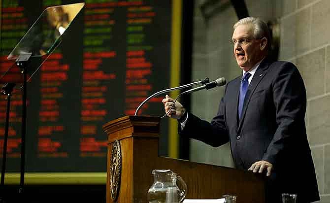 Missouri Gov. Jay Nixon delivers the annual State of the State address to a joint session of the House and Senate, Wednesday, Jan. 21, 2015, in Jefferson City, Mo.