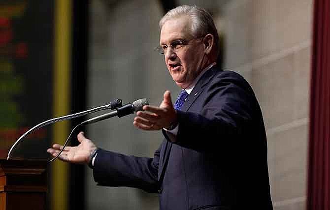 Missouri Gov. Jay Nixon delivers the annual State of the State address to a joint session of the House and Senate Wednesday, Jan. 21, 2015, in Jefferson City, Mo. 