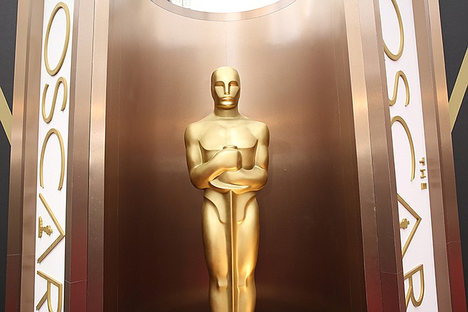 An Oscar statue appears at last year's Oscars ceremony at the Dolby Theatre in Los Angeles. Between when Academy Award nominations are announced, and Feb. 22, the night of the ceremony, film fans flock to the theaters to see the nominated works.
