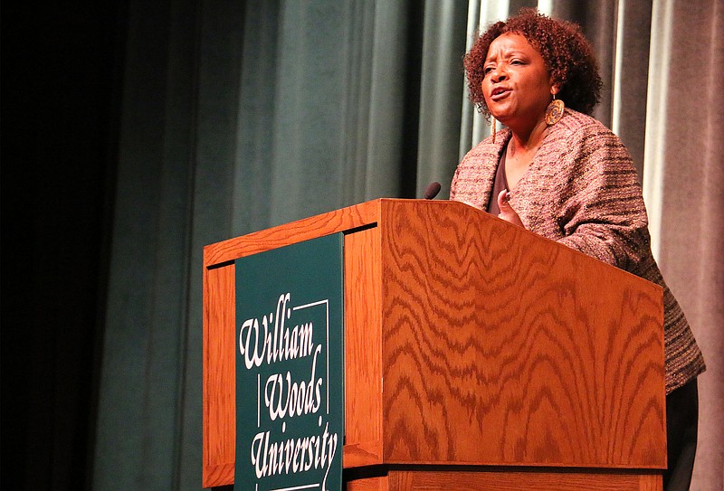 Nontombi Naomi Tutu speaks at William Woods University Thursday night. Tutu said her role in contributing to a more just world is to combine her passion for public speaking with her concerns for race and gender equality. She travels and speaks to groups on various topics related to equality issues.