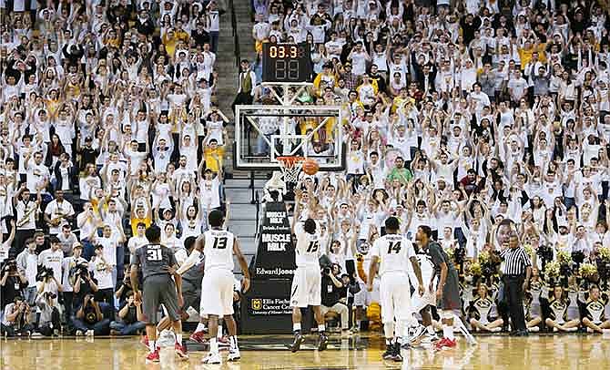 Missouri guard Wes Clark misses his second free throw attempt to tie the game in the final seconds of an NCAA college basketball game against Arkansas, Saturday, Jan. 24, 2015, in Columbia, Mo. Arkansas won 61-60.