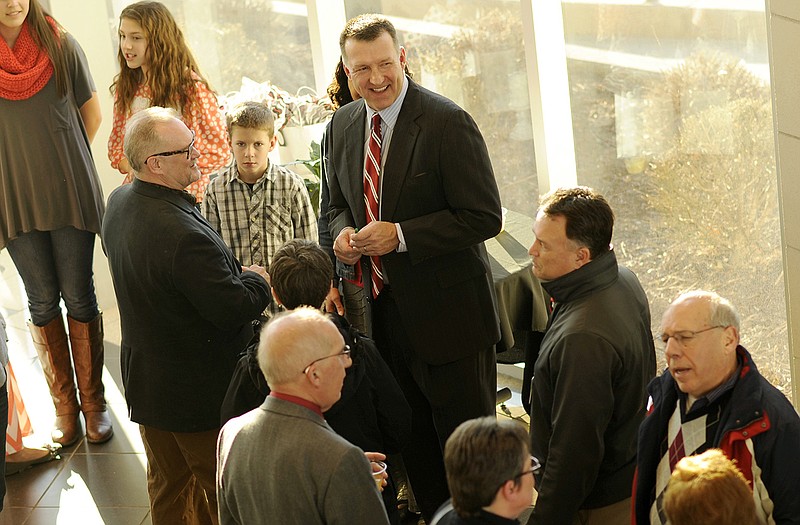 Incoming Jefferson City Public Schools Superintendent of Schools Larry Linthacum, center, stands alongside his family while meeting with members of the public during a meet-and-greet reception hosted by the Board of Education at the Miller Performing Arts Center on Monday afternoon.