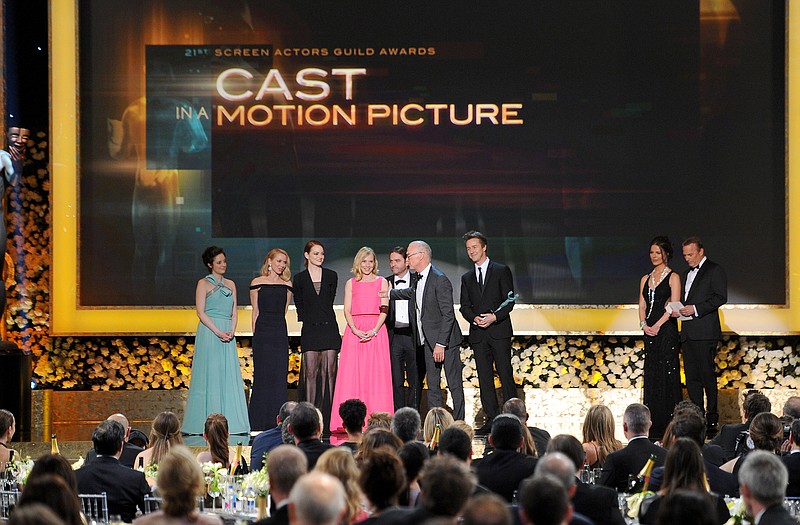The cast of "Birdman" accepts the award for outstanding performance by a cast in a motion picture on stage during the 21st annual Screen Actors Guild Awards at the Shrine Auditorium on Sunday.