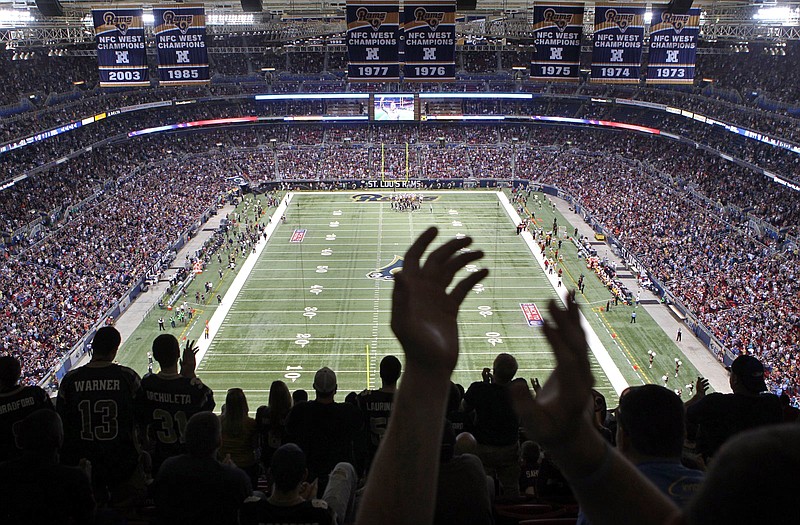 Rams fans applaud their team during a 2012 game against the Redskins at the Edward Jones Dome.